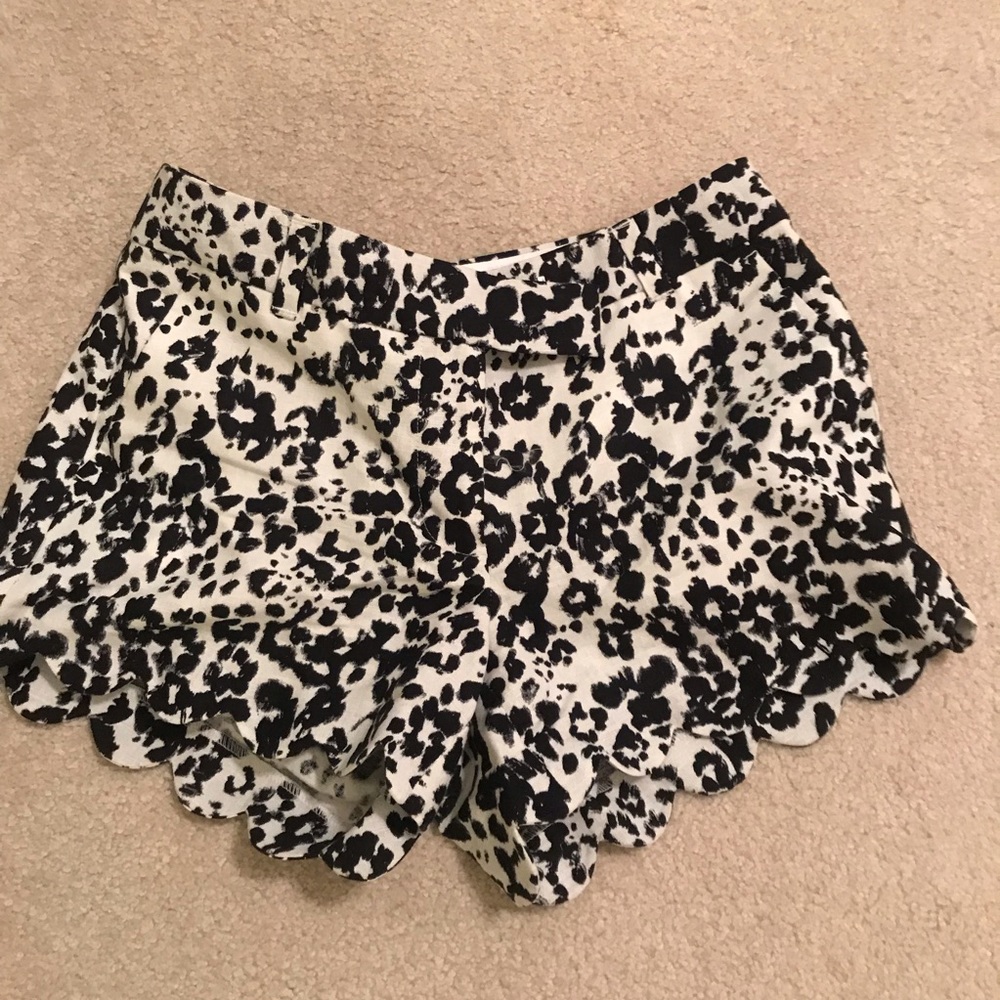 Short shorts with scallop edging